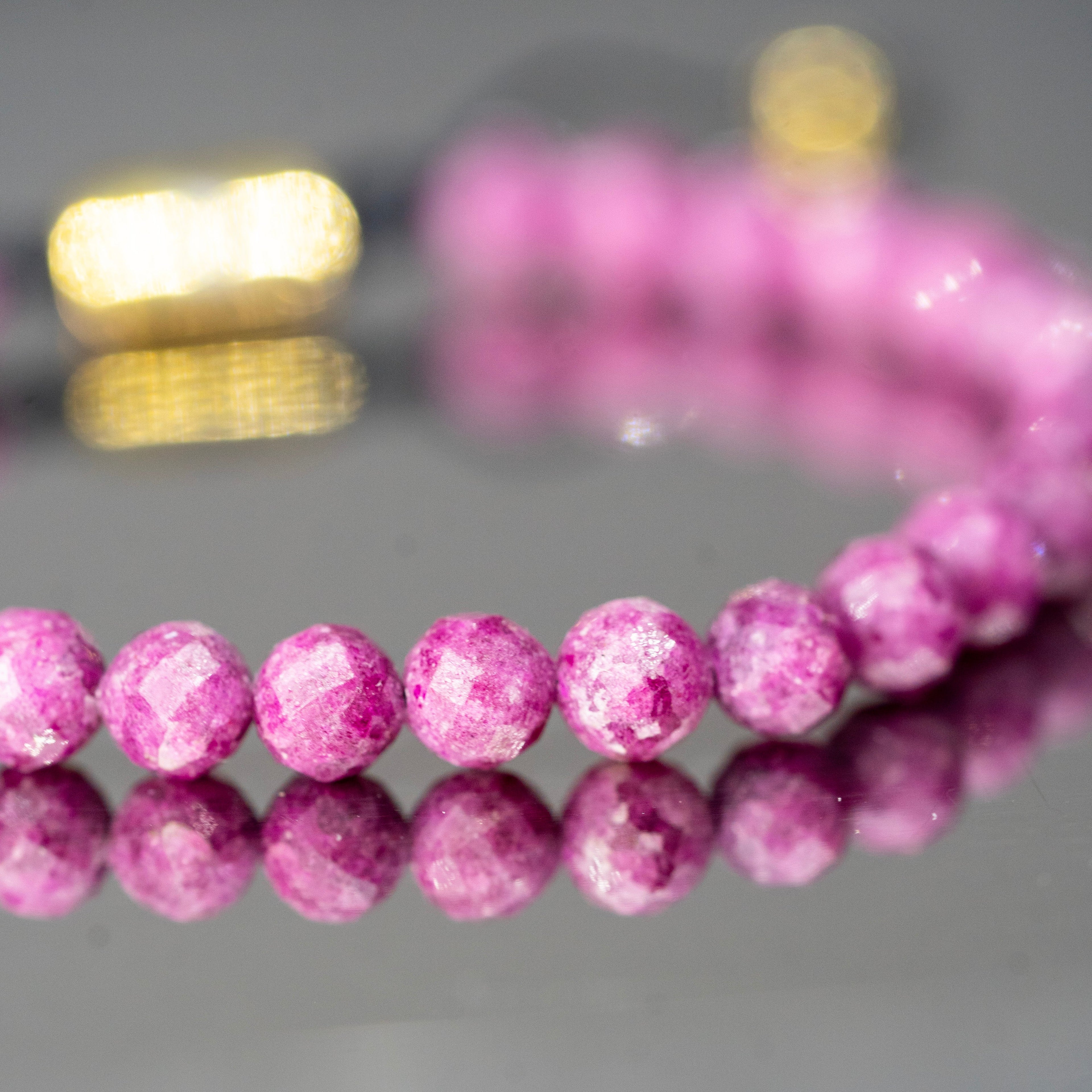 Pulsera rubí facetado